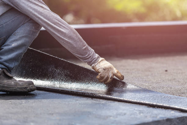 Professional Emergency Waterproofing technician working in Baltimore, OH